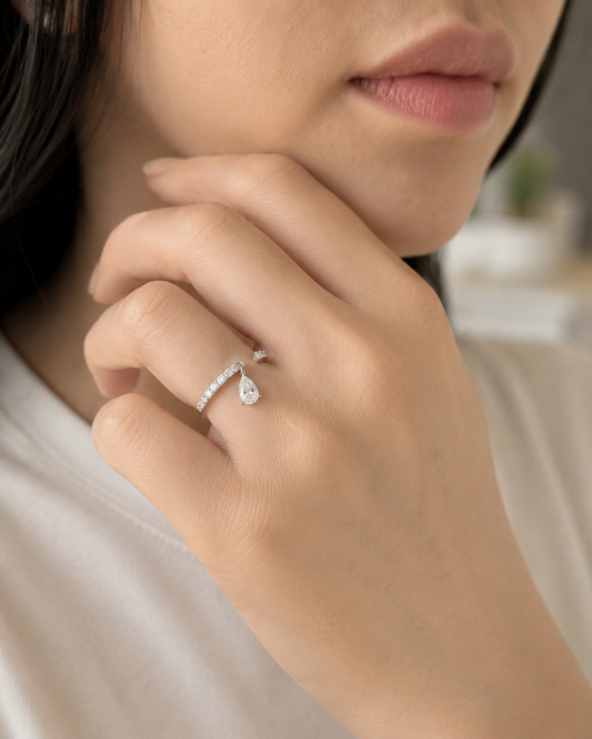 Zethech Pear Solitaire Ring in clean product photo