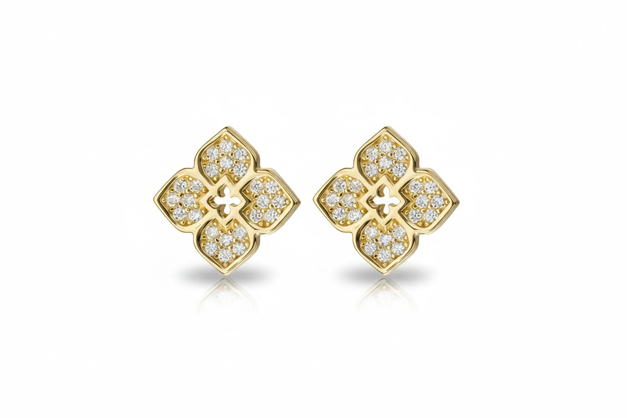 Elegant flower-shaped moissanite stud earrings by Zethech featuring sparkling gemstone accents and a classic stud design.