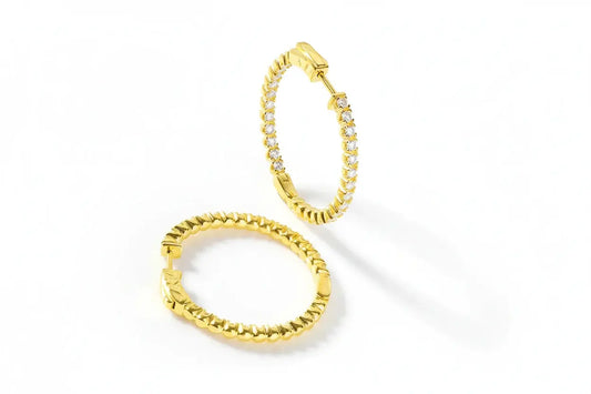 Pair of gold-colored Zethech Luminous Halo 2mm full moissanite hoop earrings for women, sterling silver with 18k gold plating.
