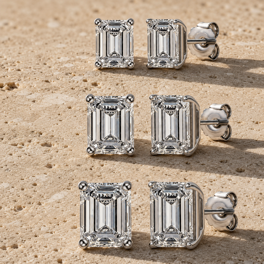 Luna rectangular-cut moissanite stud earrings in multiple sizes on sunlit travertine