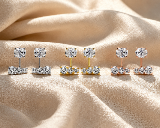 Aurora moissanite cascade earrings in white, yellow and rose gold-plated finishes on champagne fabric