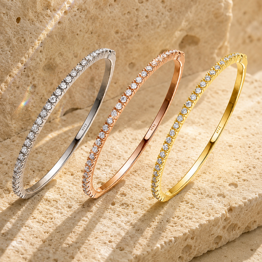 Eclipse round-cut moissanite tennis bracelets in silver, rose, and yellow-gold-tone finishes