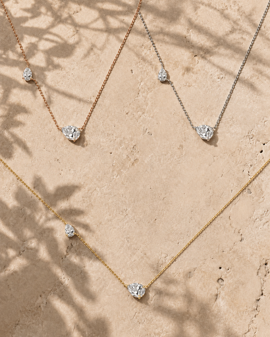 Twin Pear-Cut Moissanite Necklace — two pear-cut moissanite focal stones