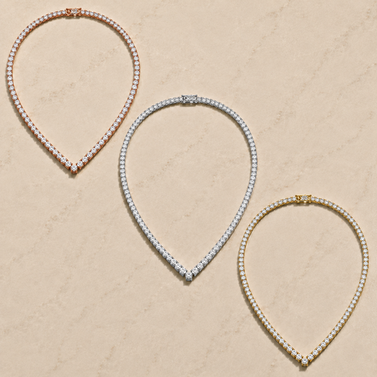 V-Shape Moissanite Tennis Necklace — V-shaped line of round moissanite stones