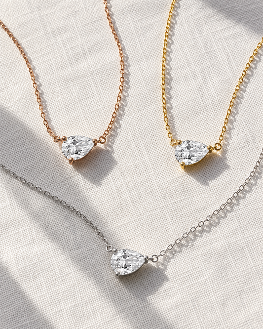 Pear-Cut Moissanite Drop Necklace — pear-cut moissanite pendant on a fine chain