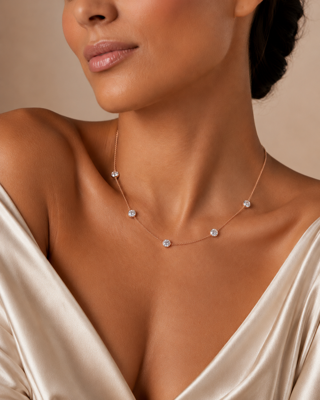 Elegant bubble-shaped moissanite necklace by Zethech, featuring sparkling stones on a delicate chain.