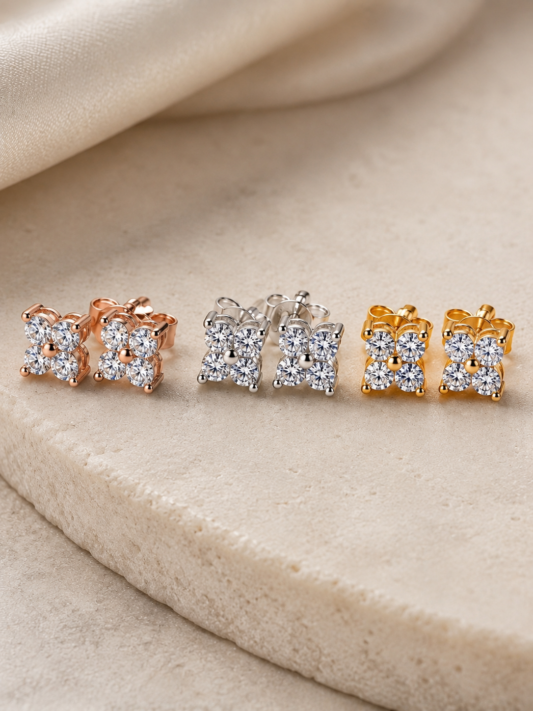 Close-up of Zethech Quad Moissanite Studs with four stones