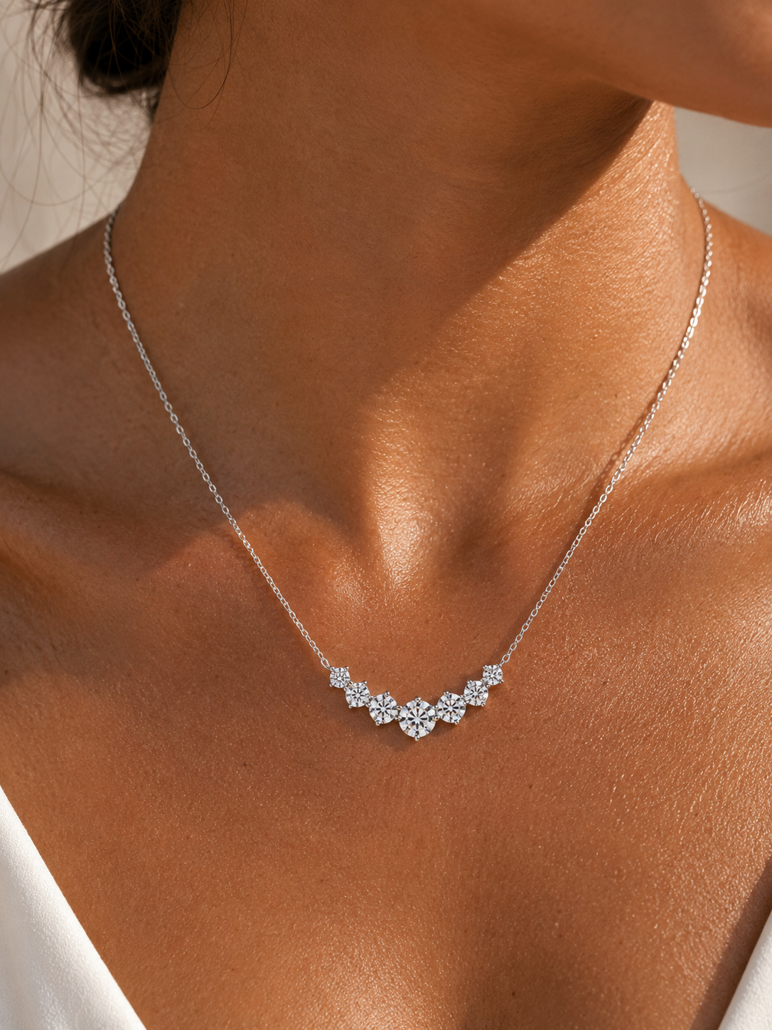 Close-up of Zethech Oval Solitaire Necklace with oval-cut moissanite pendant