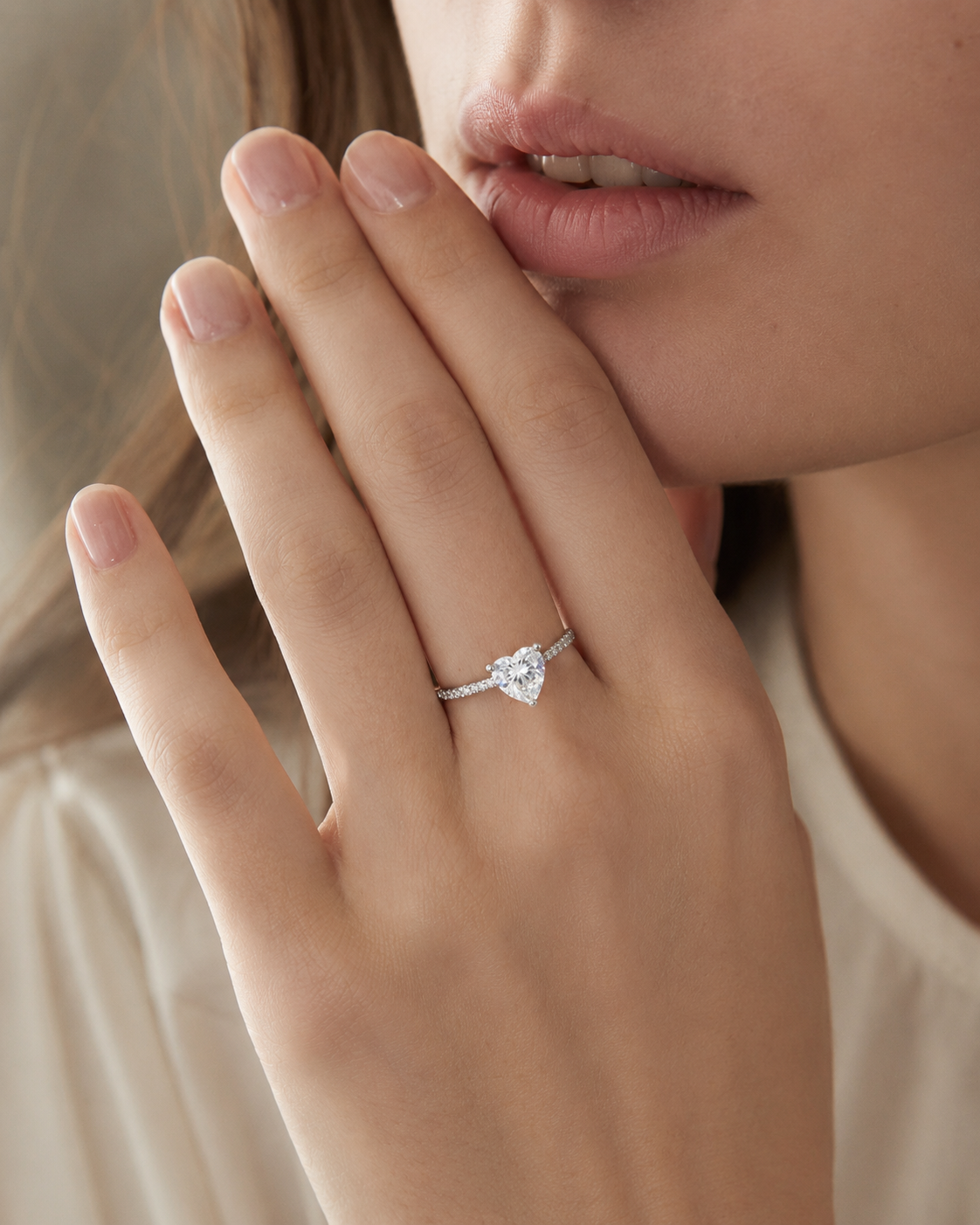 Close-up of Zethech Amora Heart Ring worn on hand
