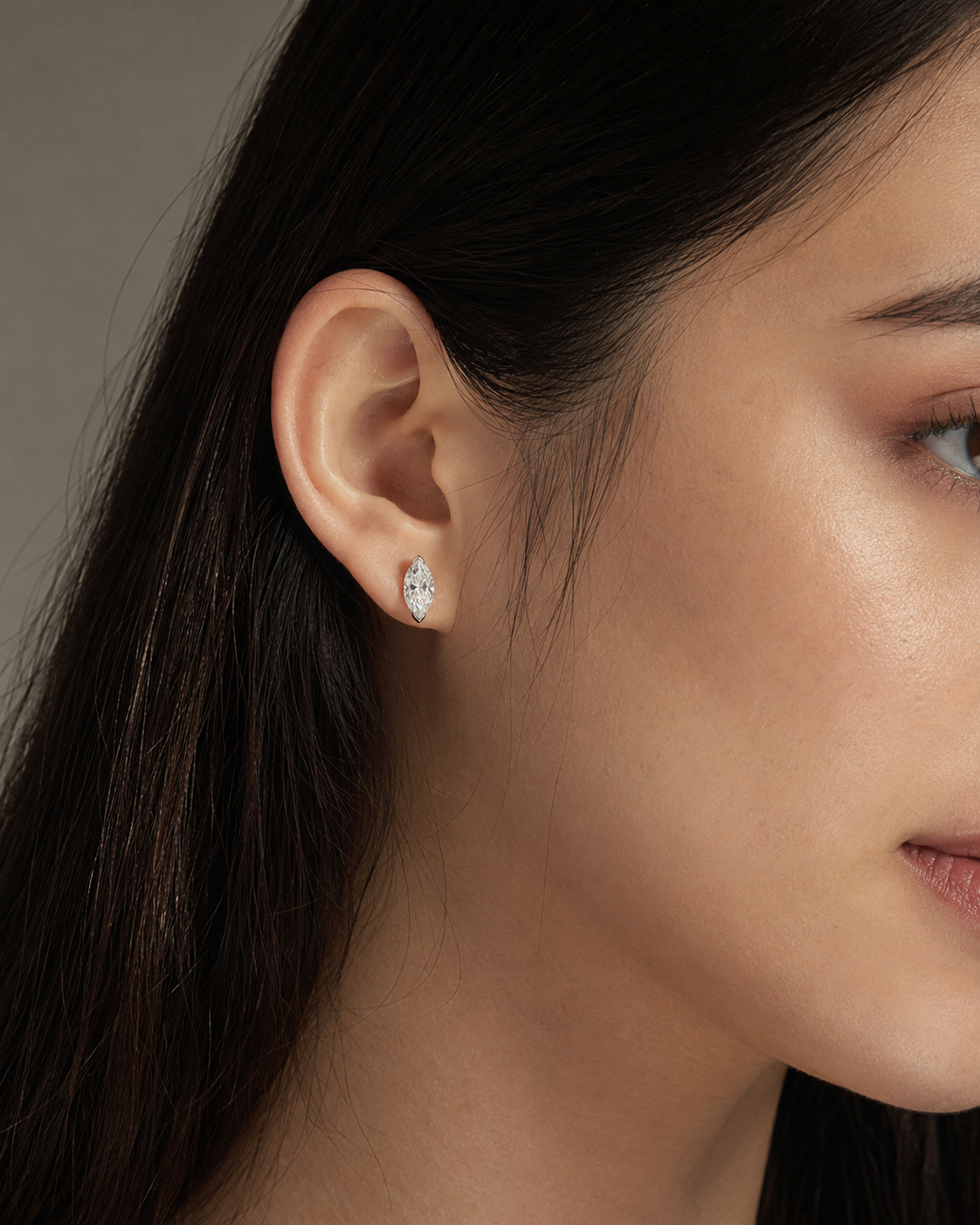 Zethech Celeste Marquise Studs worn on ear in close-up photo