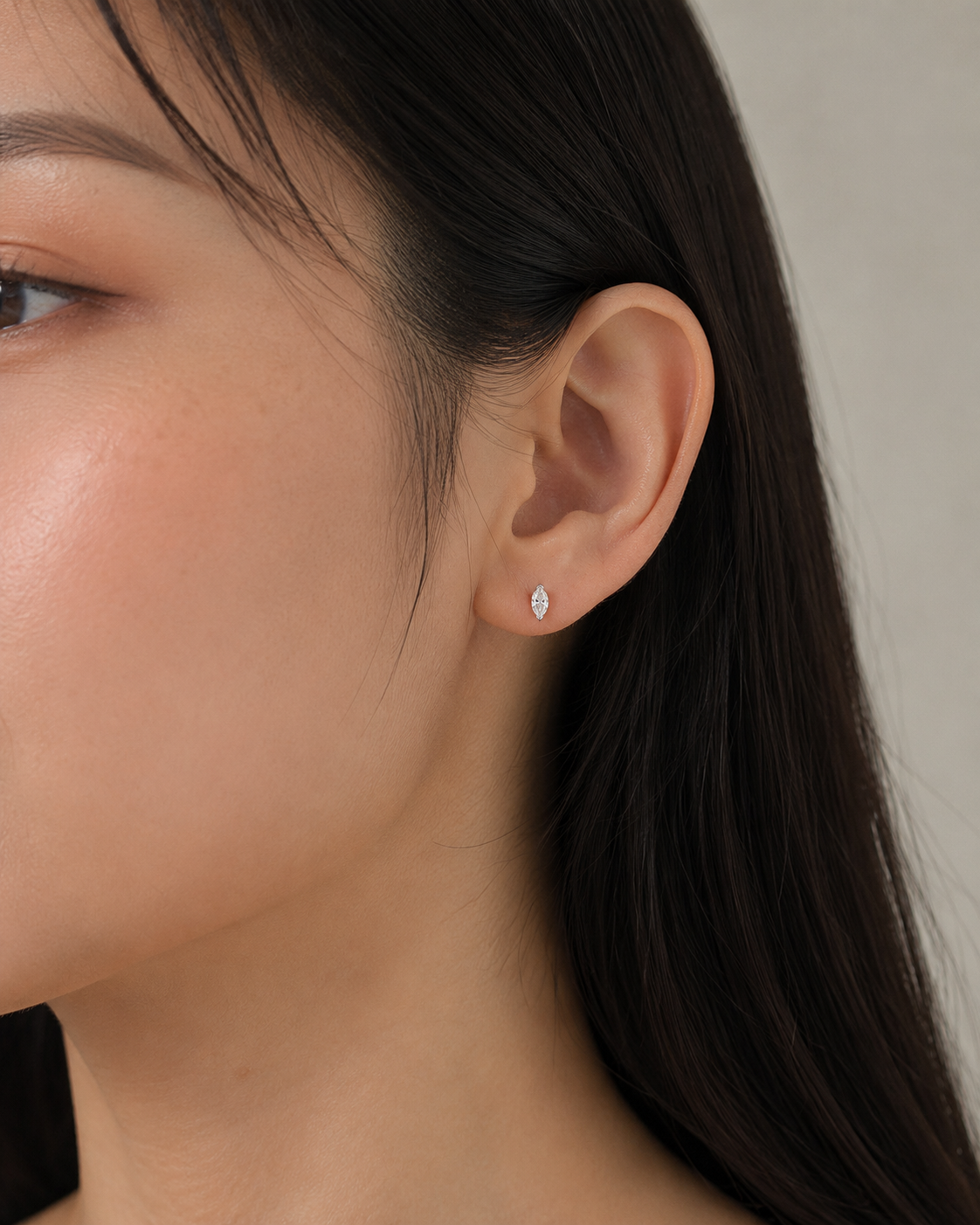 Zethech Celeste Marquise Studs worn on ear with natural detail