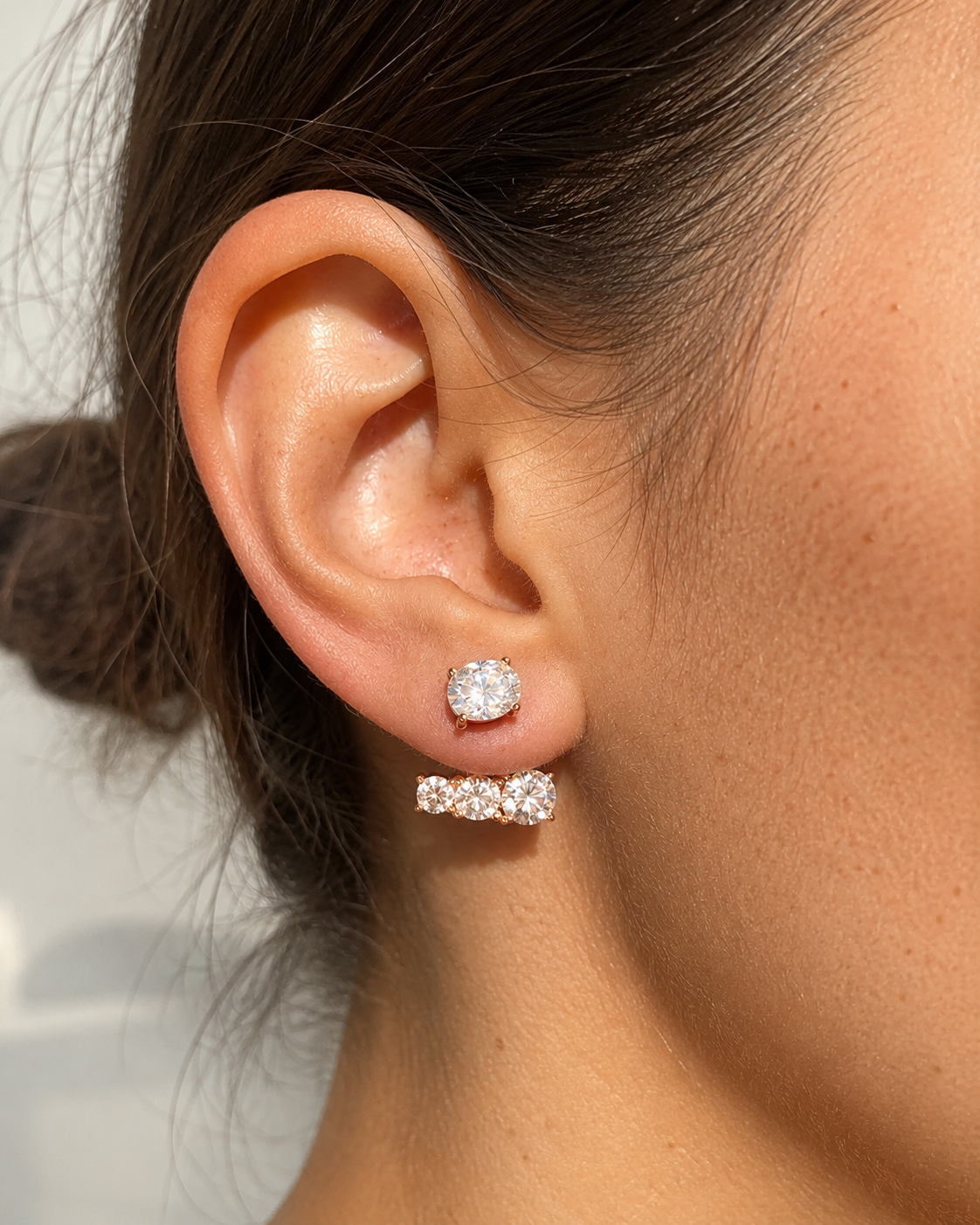 Close-up of Zethech Aurora Cascade Earrings on ear