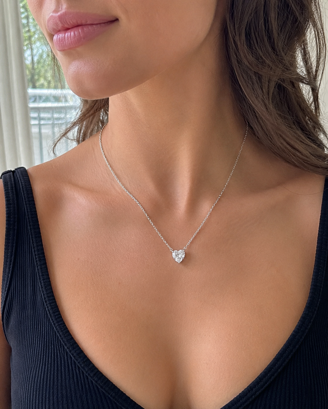 Zethech Celeste Heart Necklace worn on model in silver finish