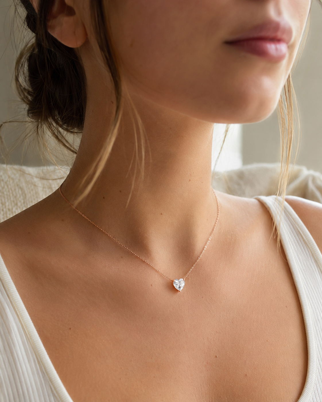 Close-up of Zethech Celeste Heart Necklace with heart moissanite pendant