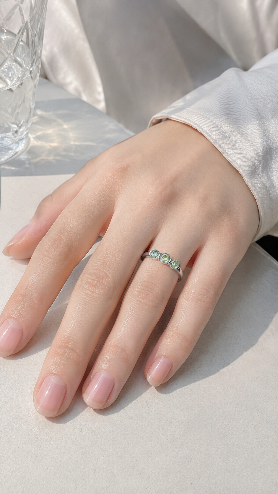 Zethech Halo Round Ring worn on hand against a light background