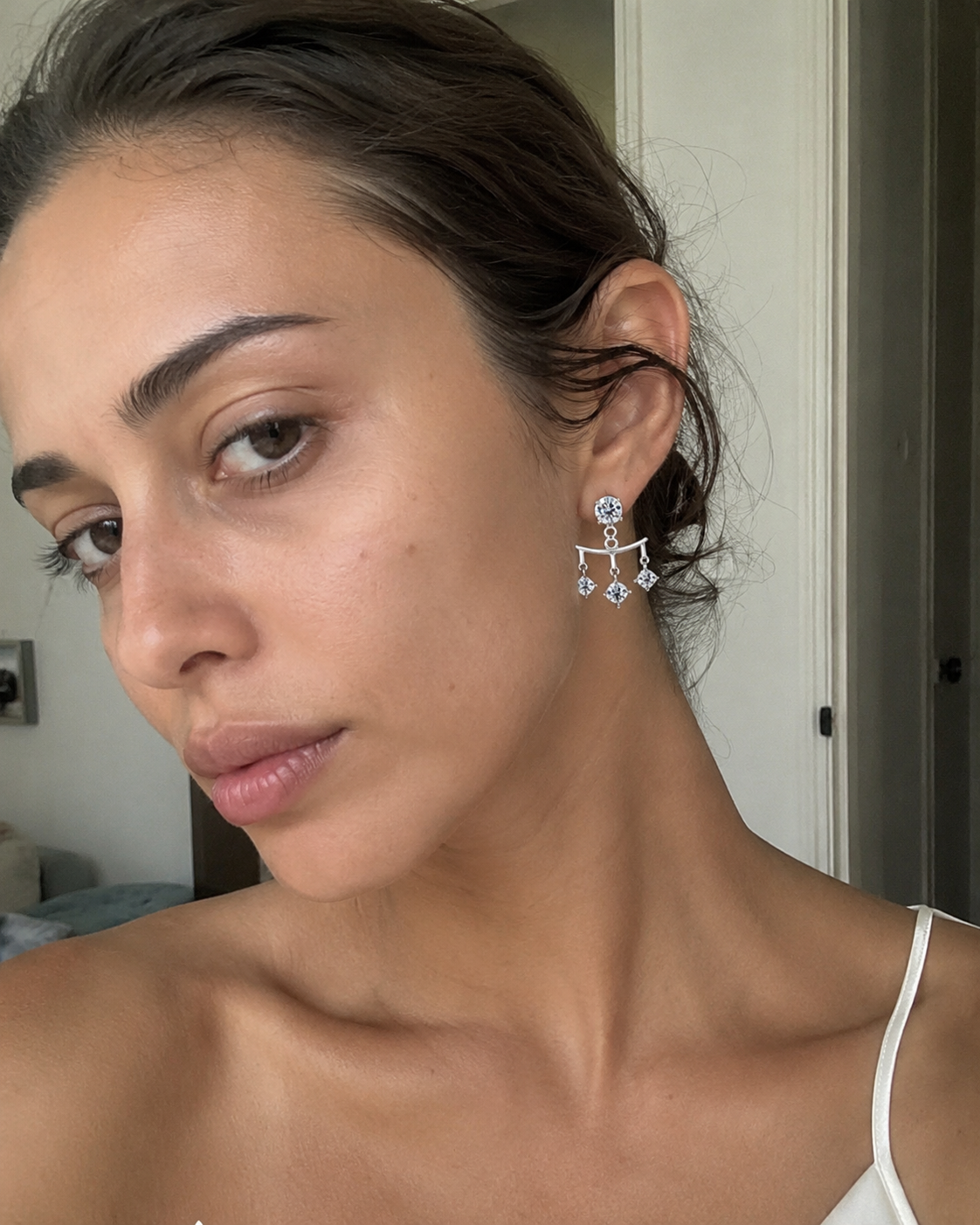 Close-up of Zethech Classic Drop Earrings with moissanite detail
