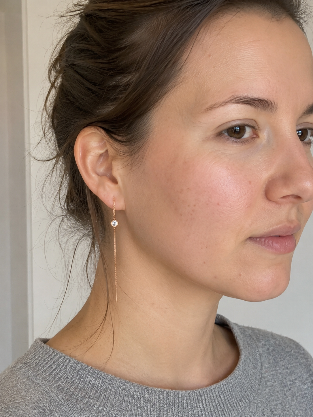 Close-up of Zethech Cascading Drop Earrings with moissanite detail
