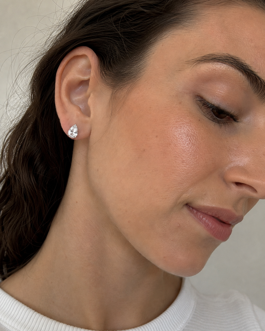 Close-up of Zethech Round Moissanite Huggies with round stones