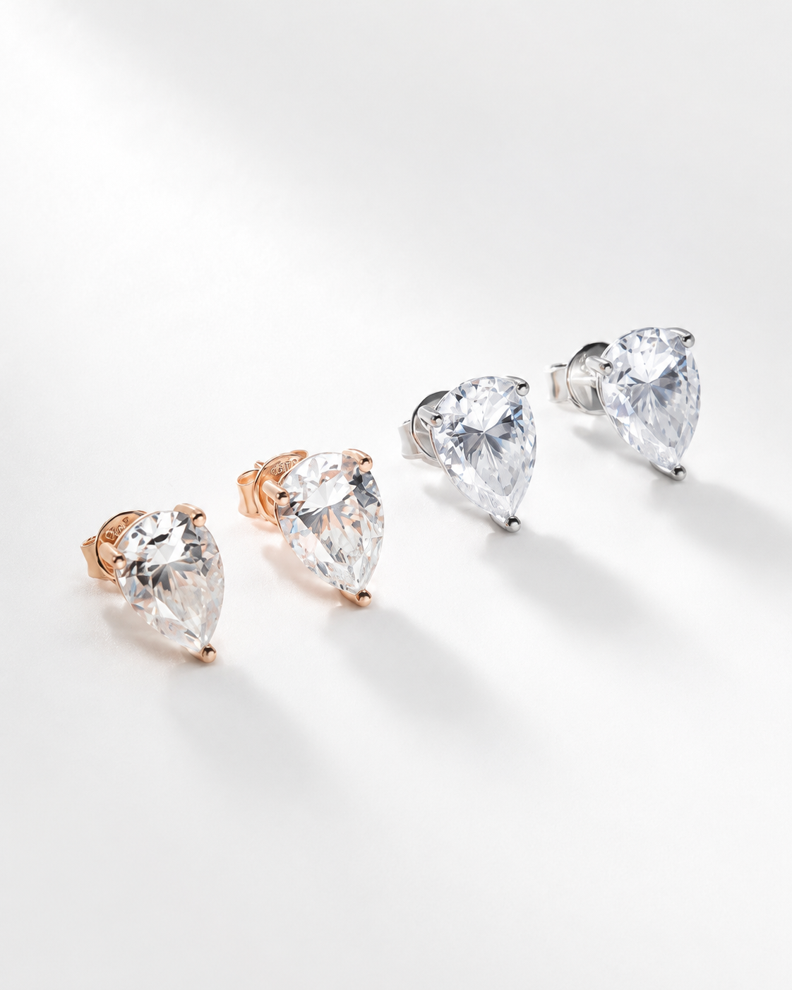 Zethech Round Moissanite Huggies in detailed close-up