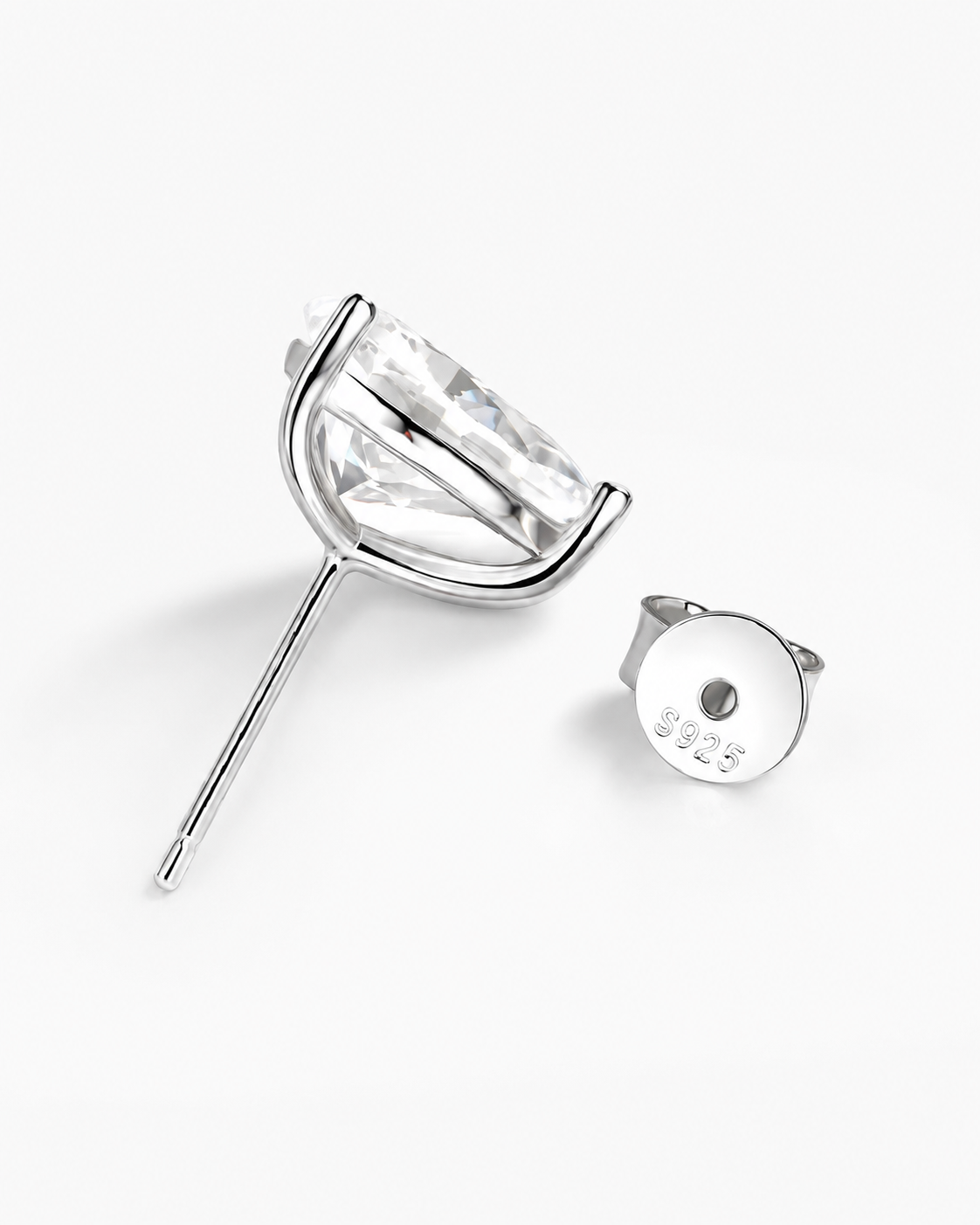 Detailed view of Zethech Round Moissanite Huggies with silver-tone finish