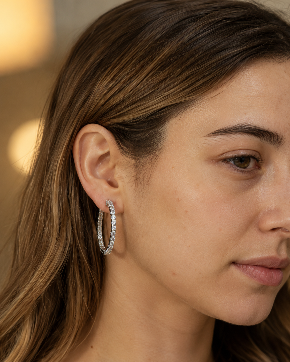 Close-up of Zethech Halo Hoop Earrings with 2mm moissanite stone detail