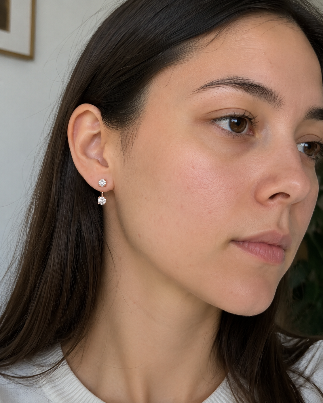 Close-up of Zethech Essential Stud Earrings in rose gold setting