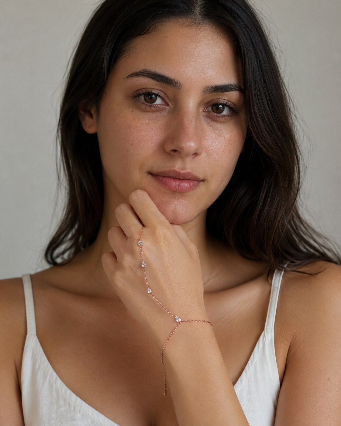 Close-up of Zethech Pear Hand Chain Bracelet with pear stone detail