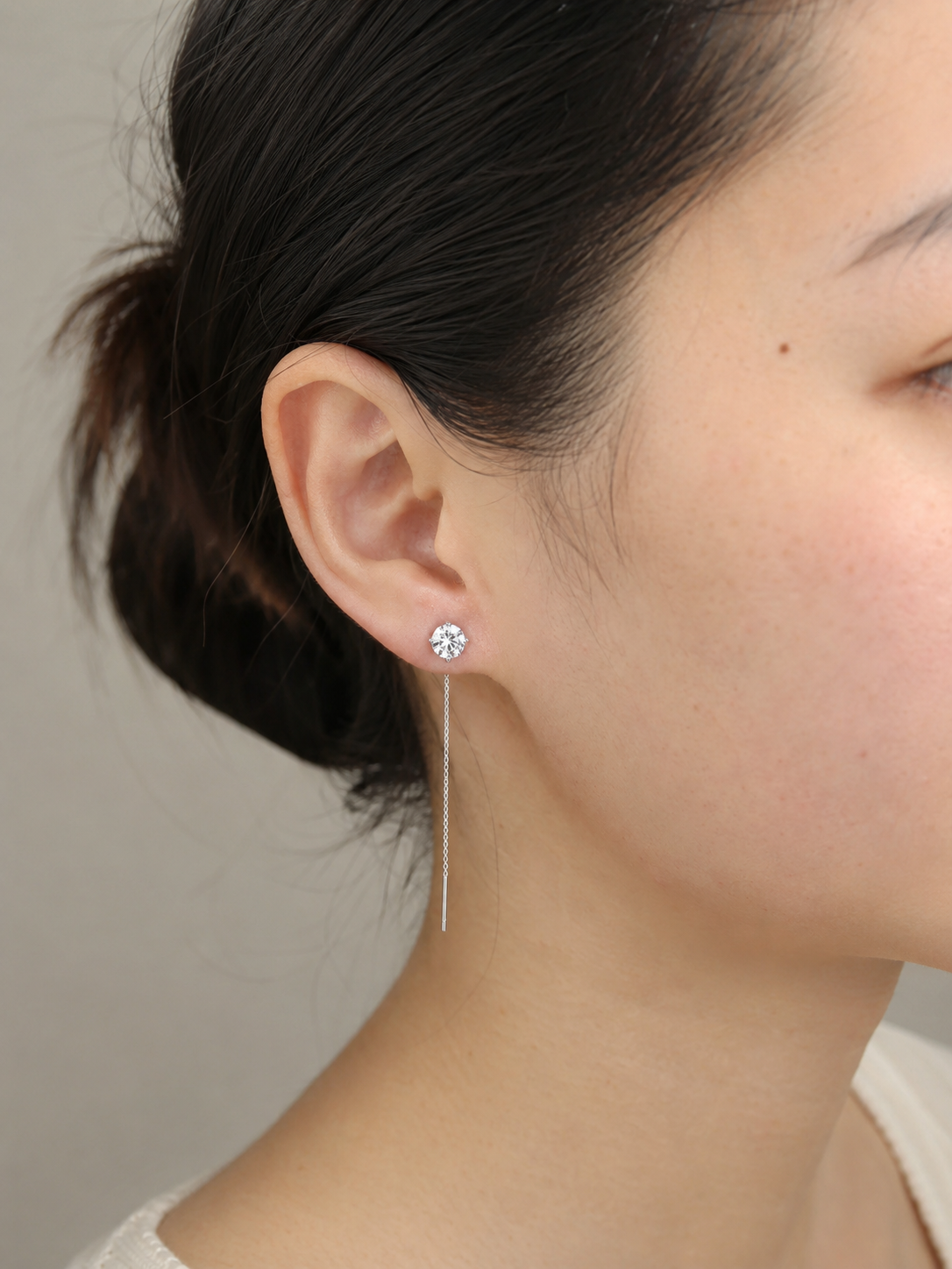 Close-up of Zethech Tassel Drop Earrings with sparkling tassel design