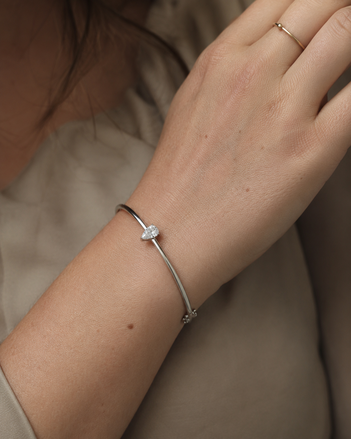 Zethech Pear Solitaire Bangle close-up with pear-shaped moissanite stone
