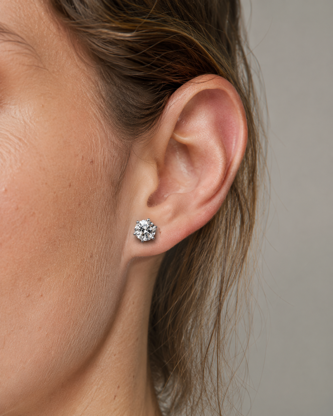 Close-up of Zethech Crown Stud Earrings with claw setting