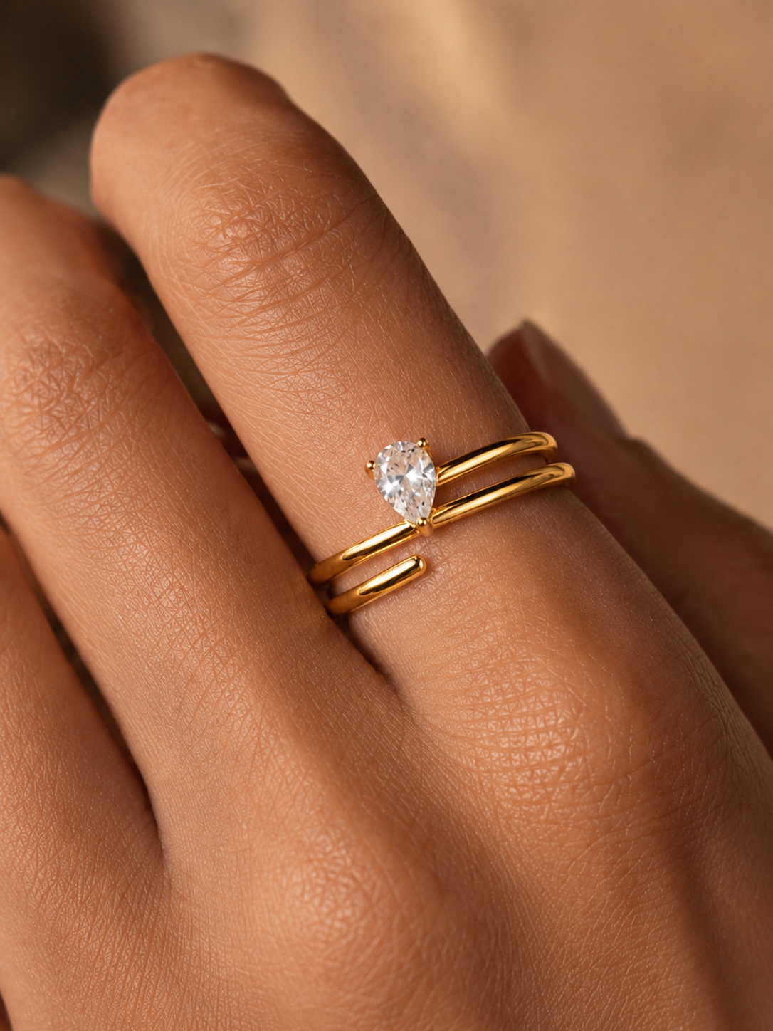Zethech Pear Moissanite Ring with sleek band and pear setting