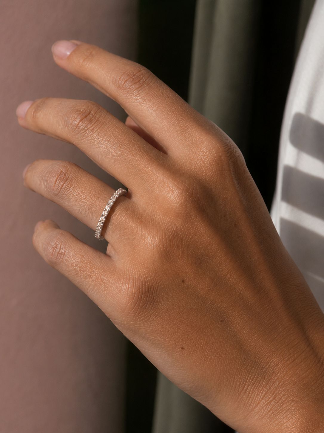 Close-up of Zethech Moissanite Eternity Band with full-circle stones