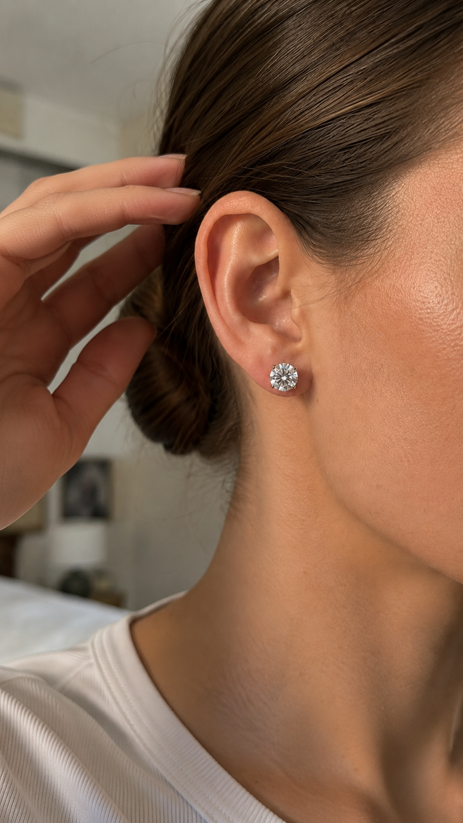 Close-up of Zethech Rose Moissanite Studs with round moissanite sparkle