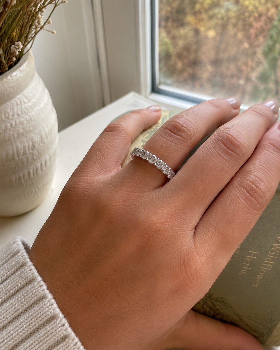 Zethech Classic Moissanite Eternity Ring shown from product angle with polished silver band