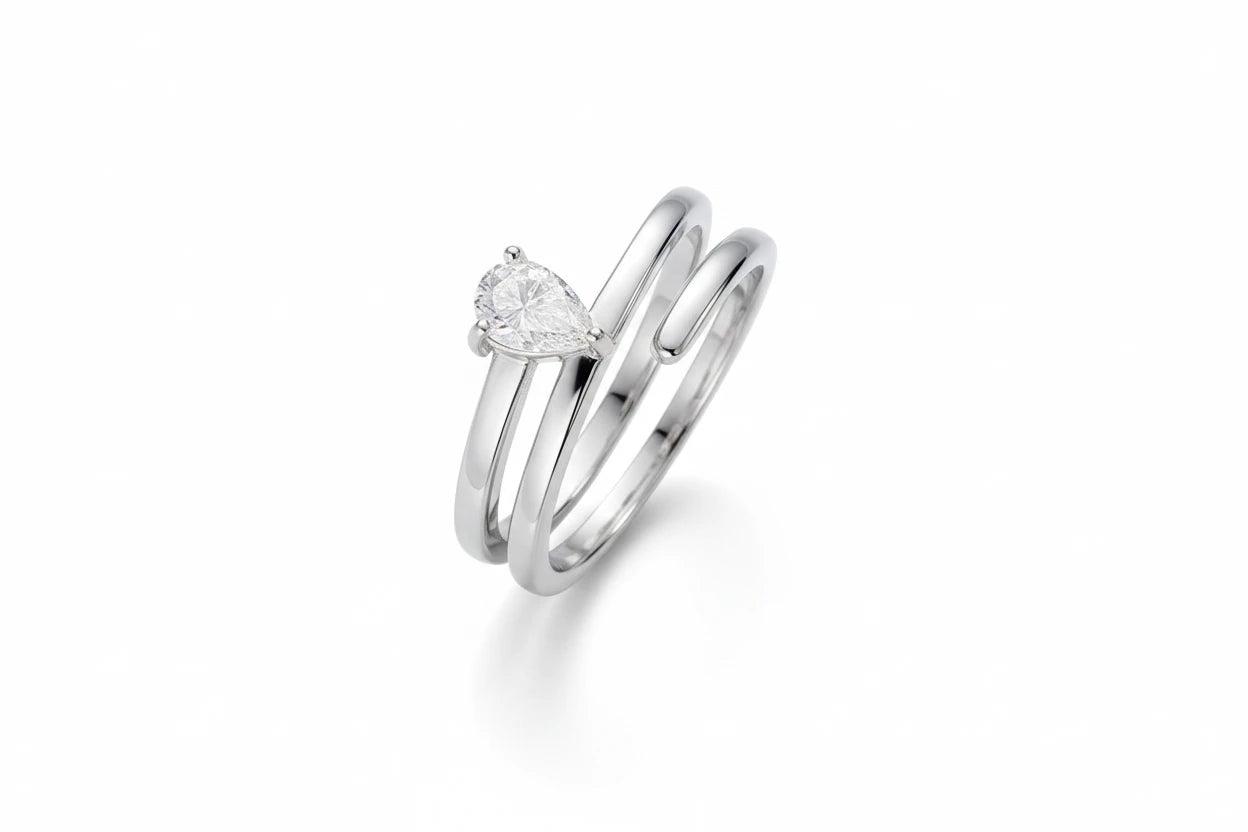 Zethech Pear Moissanite Ring with polished band design