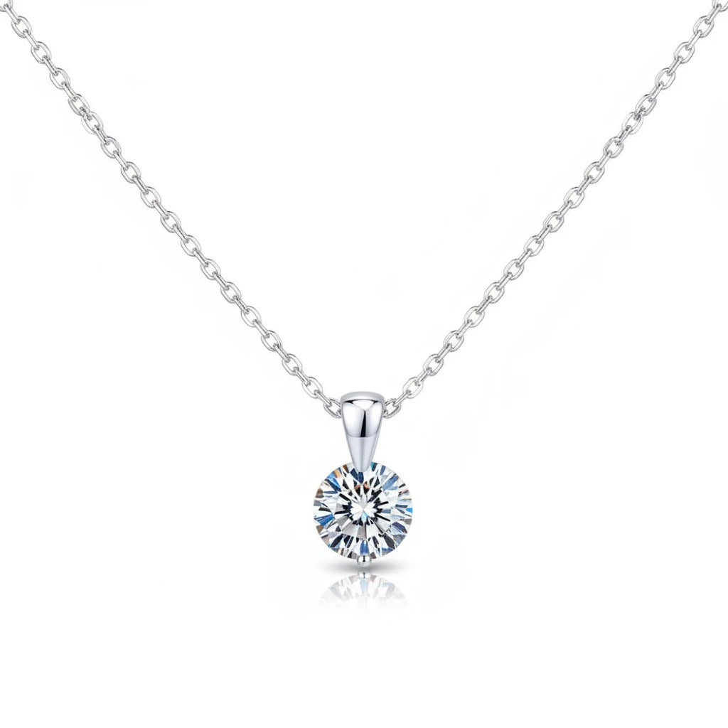 Zethech Halo Solitaire Necklace with round pendant on textured surface