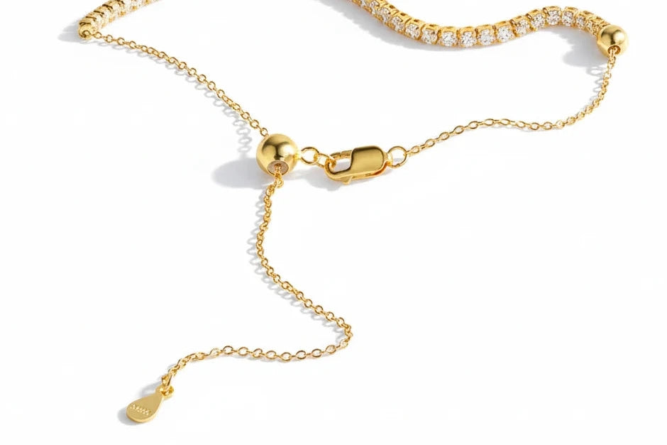 Elegant moissanite tennis necklace from Zethech featuring a sparkling row of gemstones on a delicate chain.