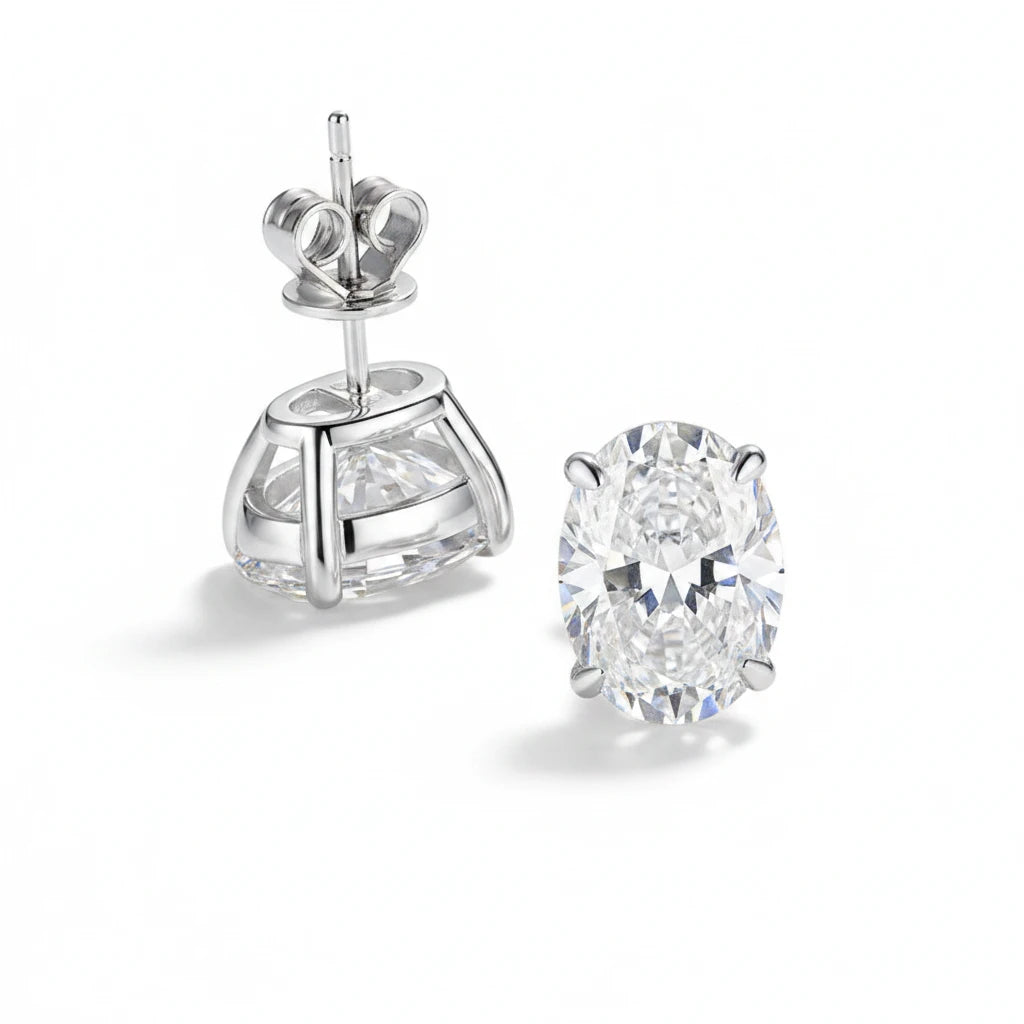 Zethech Verona Oval Stud Earrings with clear stones on wooden surface