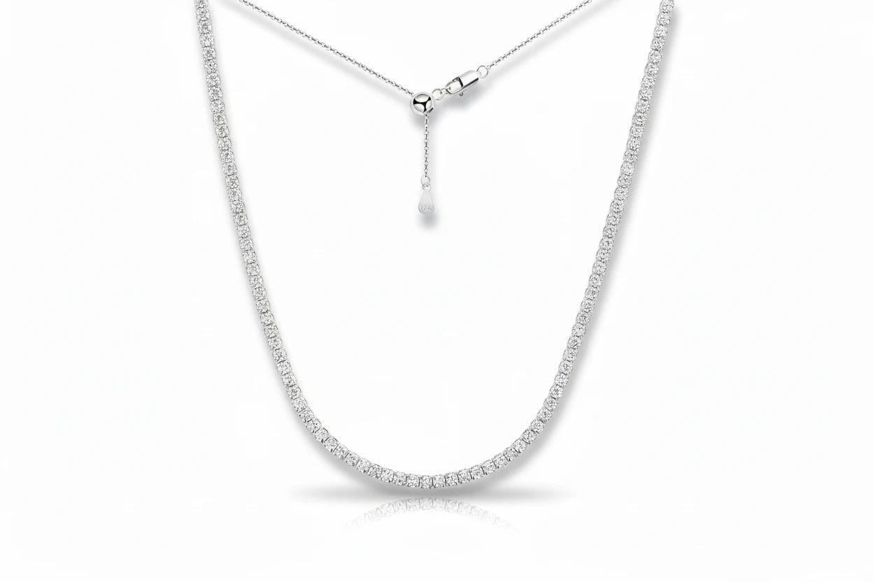 Moissanite tennis necklace by Zethech with sparkling gemstones set in a delicate chain.
