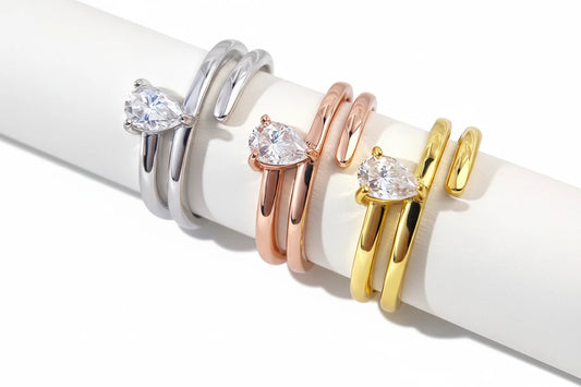 Pear moissanite ring by Zethech featuring a sparkling pear-shaped gemstone set in a sleek silver band.