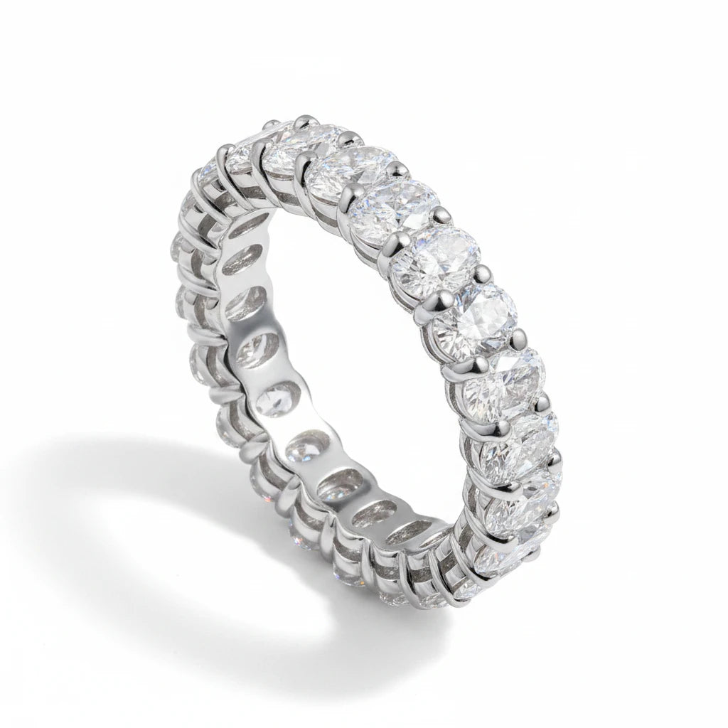 Zethech Oval Moissanite Eternity Ring on wooden surface
