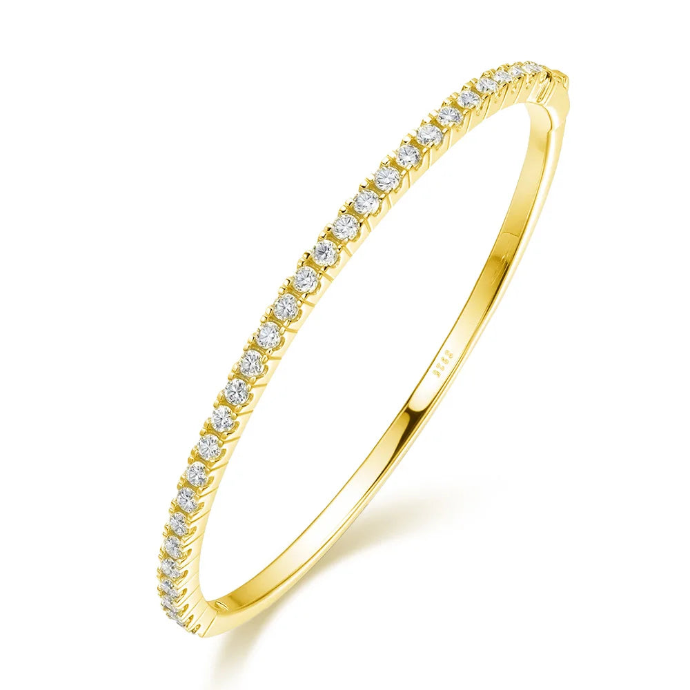 Zethech Eclipse Tennis Bracelet in yellow gold with clear stones on white background