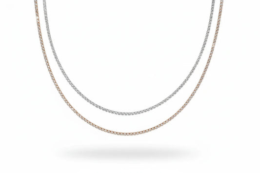 Elegant moissanite tennis necklace by Zethech with sparkling stones set in a delicate chain.