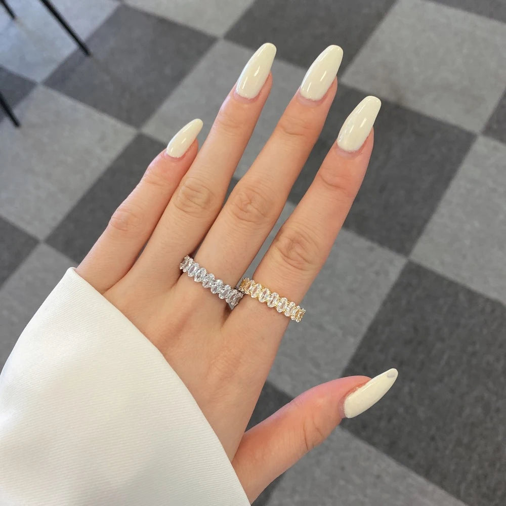 Zethech Eterna Oval Ring worn on hand with moissanite detail