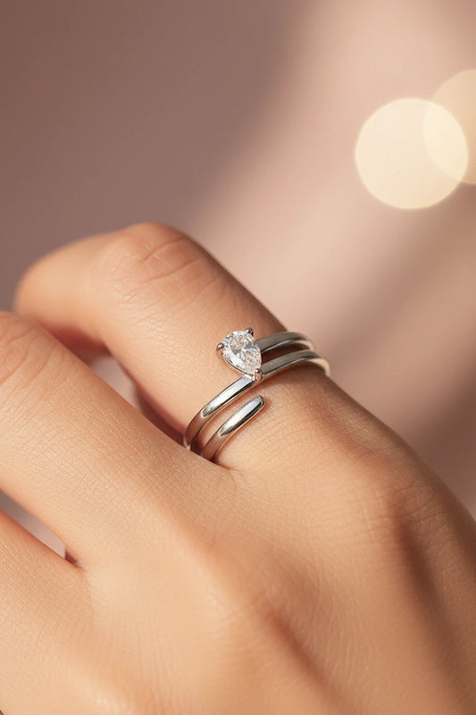 Pear moissanite ring by Zethech featuring a sparkling pear-shaped gemstone set in a sleek band.