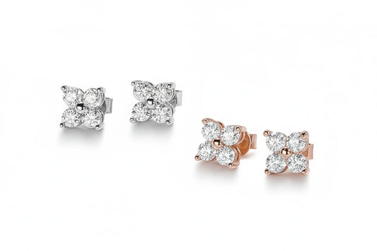 Silver Zethech quad moissanite stud earrings featuring sparkling round-cut stones set in a classic earring style.