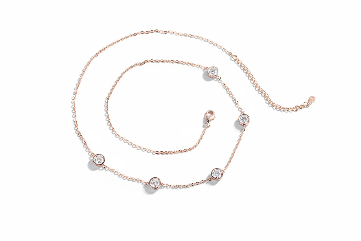 Elegant Bubble Moissanite Necklace by Zethech featuring sparkling round moissanite stones on a delicate chain.