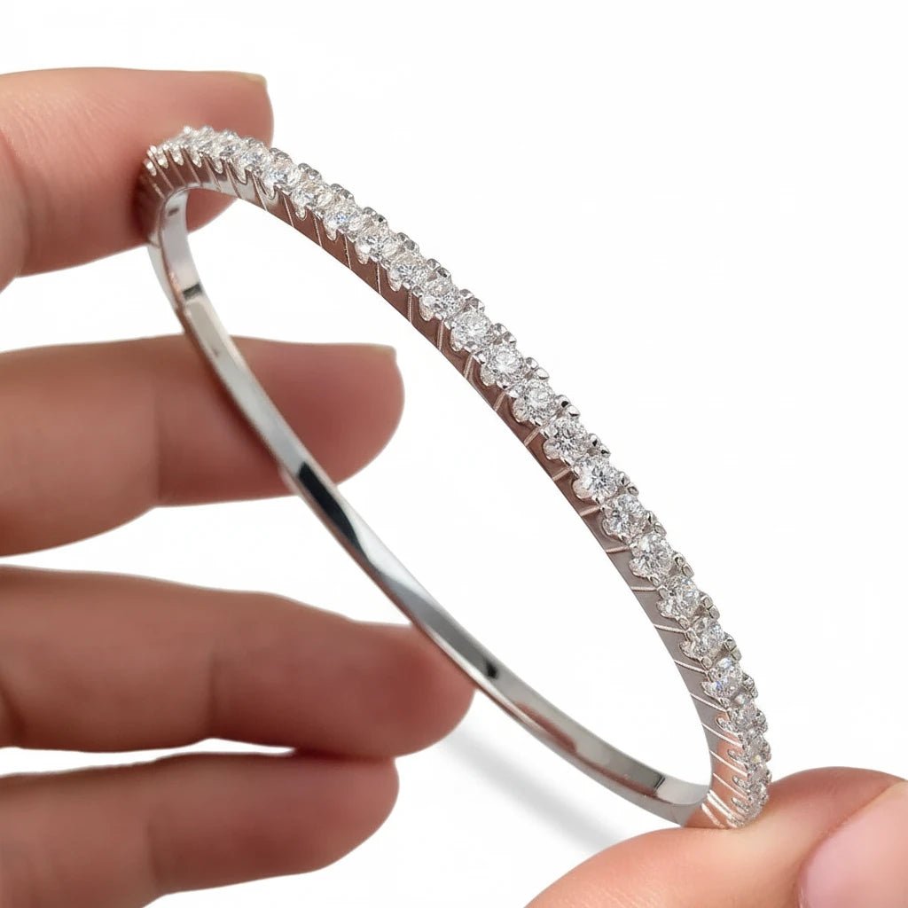 Zethech Eclipse Tennis Bracelet held by hand with stone detail