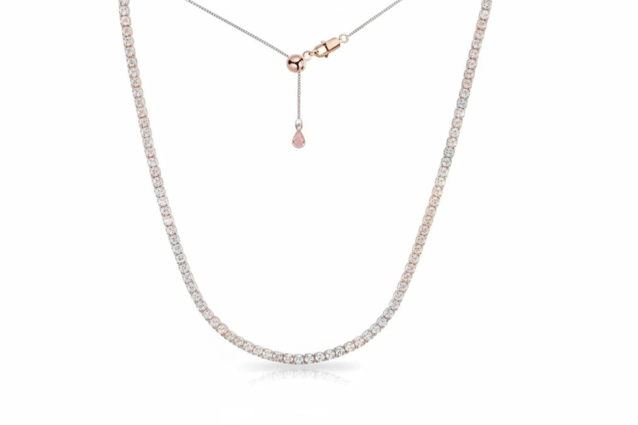 Moissanite tennis necklace by Zethech featuring a row of sparkling gemstones on a delicate chain.