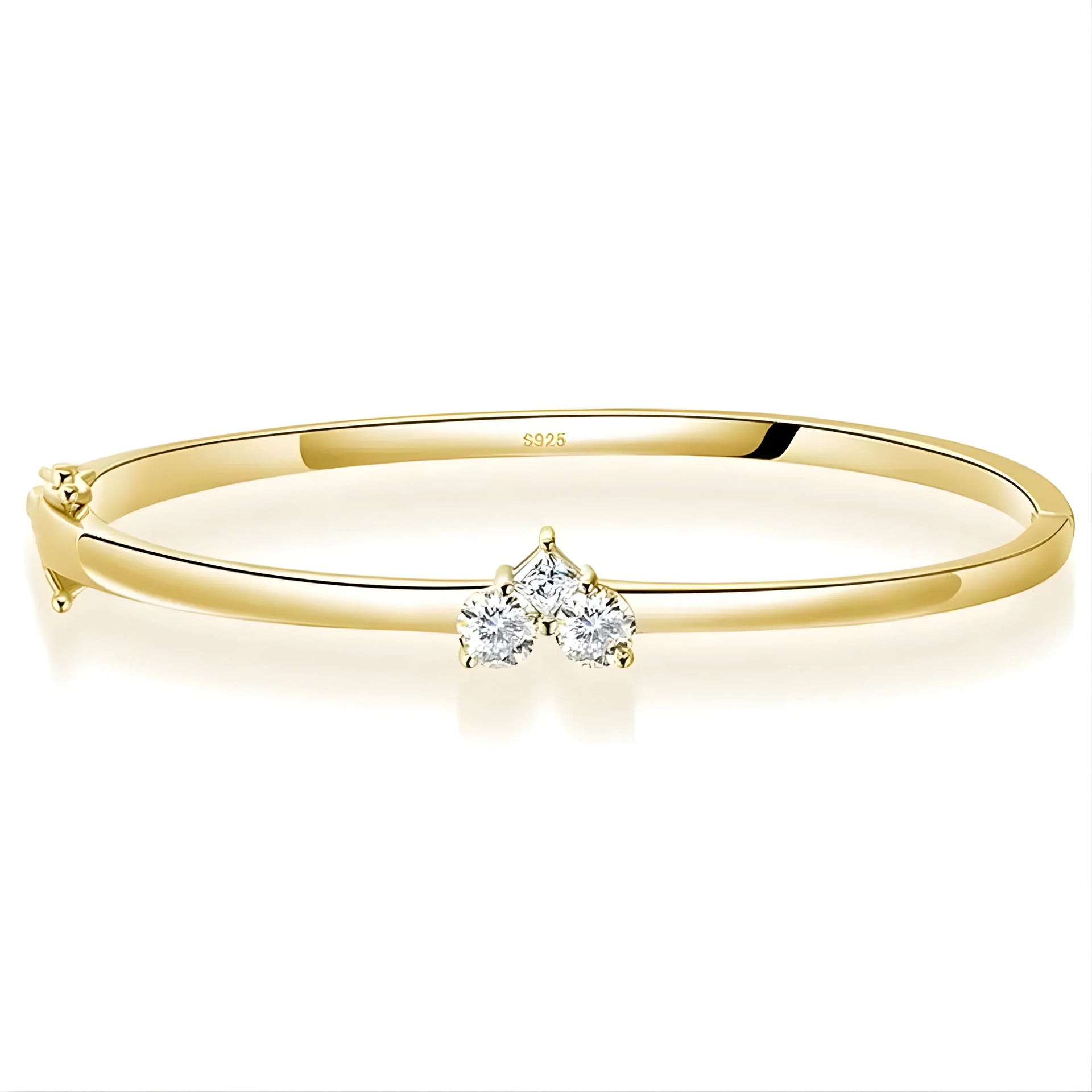 Gold bracelet with a diamond charm on a white background